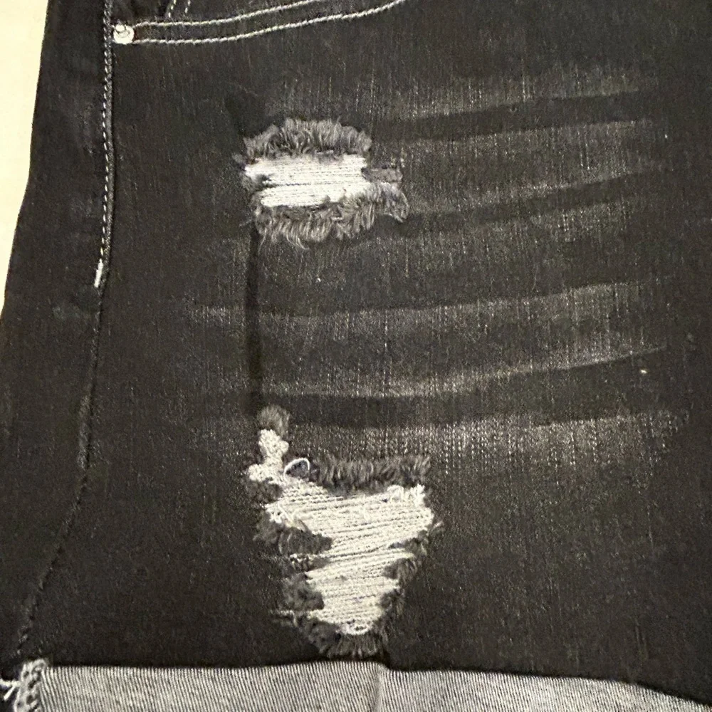 Jeans distressed denim shorts. NWT XL. Folded cuff. Black denim.